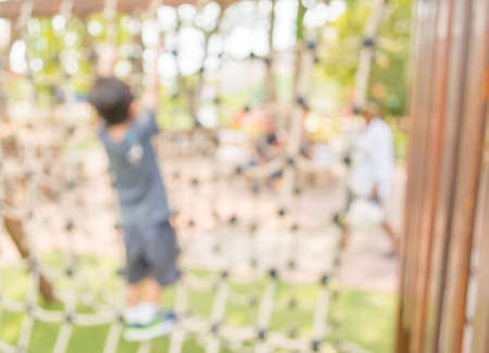 Defocused and blur image of children\'s playground at public park の写真素材