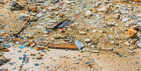 close up texture image of small pebble rock and cracked tile  on  ground for background usage .の写真素材