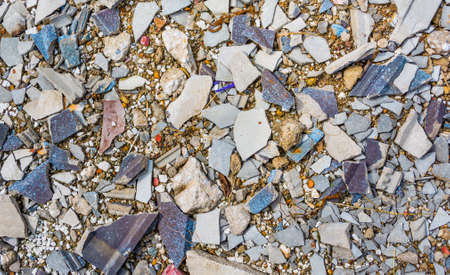 close up texture image of small pebble rock and cracked tile  on  ground for background usage .の写真素材