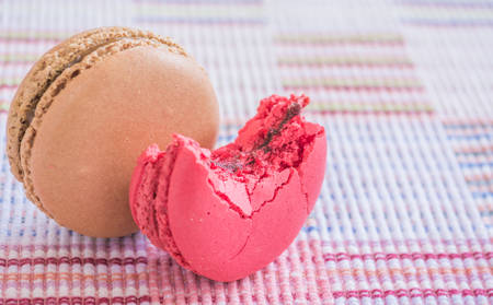 Sweet and colourful french macaroons on cotton cloth background .の写真素材