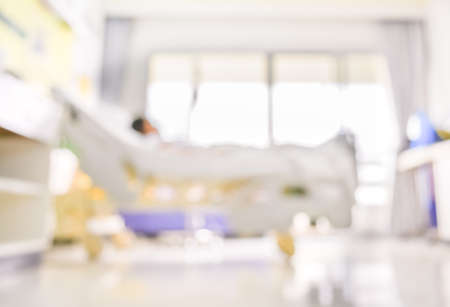blurred image of Patient with drip in hospital for background usage.の写真素材