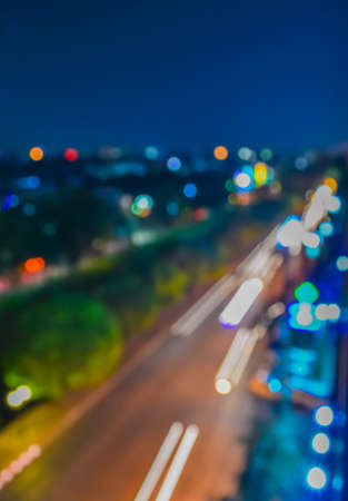 blur image of street and bokeh in night time for background usage.の写真素材