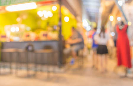 Coffee shop blur background with bokeh image .の写真素材