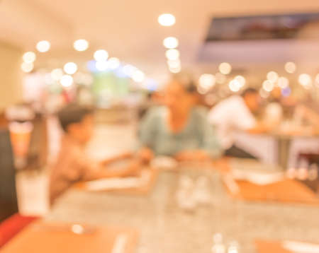 Coffee shop blur background with bokeh image .の写真素材
