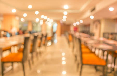 Coffee shop blur background with bokeh image .の写真素材