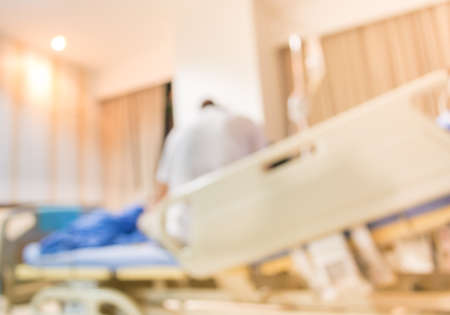 blurred image of Patient with drip in hospital for background usage .の写真素材
