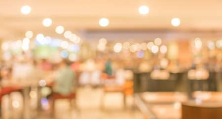 Coffee shop blur background with bokeh image .の写真素材