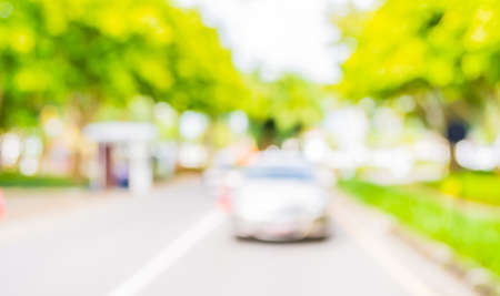 blur image of car and tree in background .の写真素材