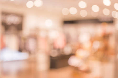 blurred image of shopping mall and people for background usage.の写真素材