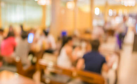 blur image of coffee shop with bokeh on day time for background usage.の写真素材