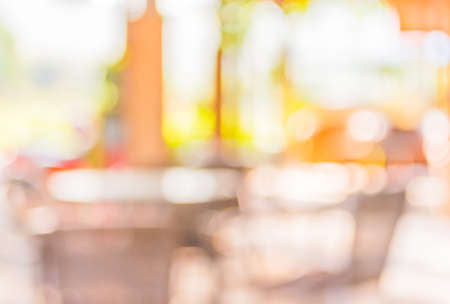 blur image of coffee shop with bokeh on day time for background usage.の写真素材