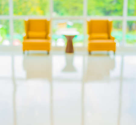 blur image of hospital office room with table and chairs for background usage.の写真素材