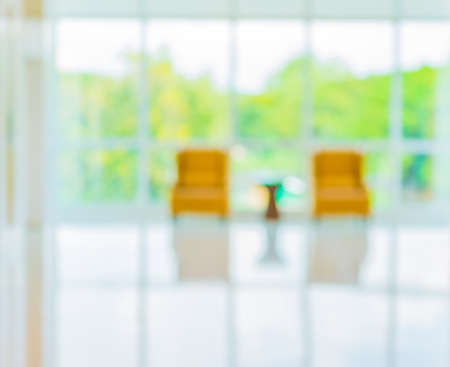 blur image of hospital office room with table and chairs for background usage.の写真素材