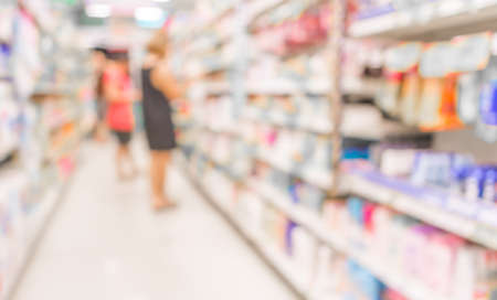 blurred image of shopping mall and people for background usage.の写真素材