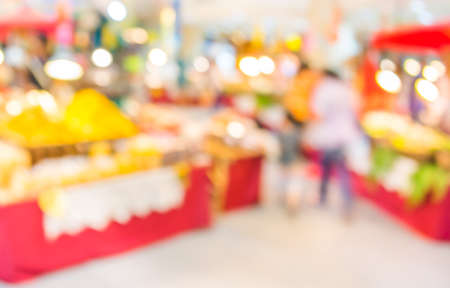 blurred image of shopping mall and people for background usage.の写真素材