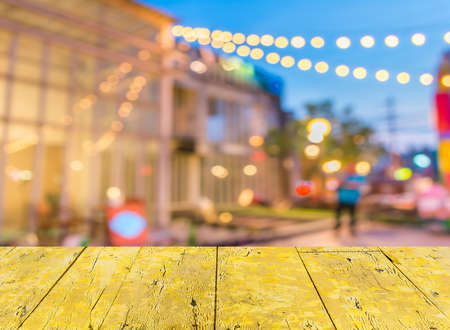 Artistic style - Defocused night street abstract texture ,blurred background with bokeh of  city on street at night.の写真素材