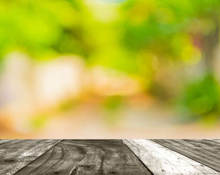 blur image of Long empty corridor with open space to the green garden with bokeh for background...