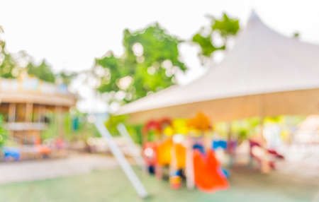 blur image of roundabout in theme park for background usage.の写真素材