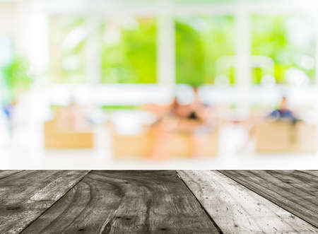 blur image of people sit in living room .