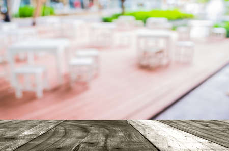 blur image of Tables and decoration prepared for an outdoor party.