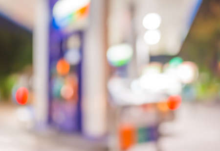 blur image of gas station on night time for background usage.の写真素材