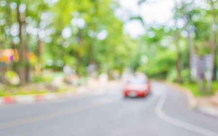 image of blur car on the road with bokeh .の写真素材