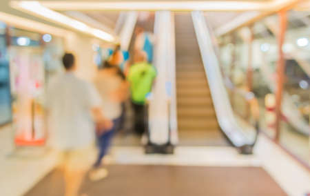 image of escalators at the modern shopping mall .
