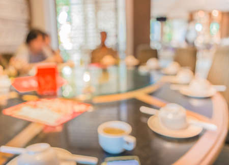 Chinese restaurant blur background with bokeh image .