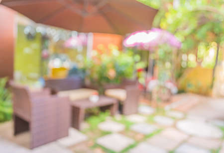 blur image of coffee shop with bokeh on day time for background usage .の写真素材