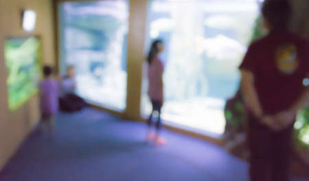 image of blur people in aquarium with bokeh .の写真素材