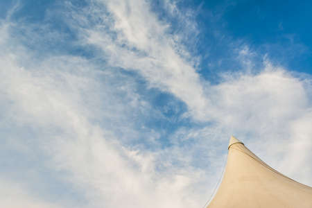 image of circus tent and clear blue sky in background.の写真素材