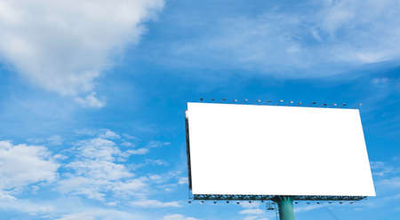 image of blank advertisement billboard with blue sky in background .の写真素材