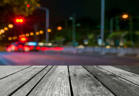 Abstract defocused lights of the night city bokeh background .