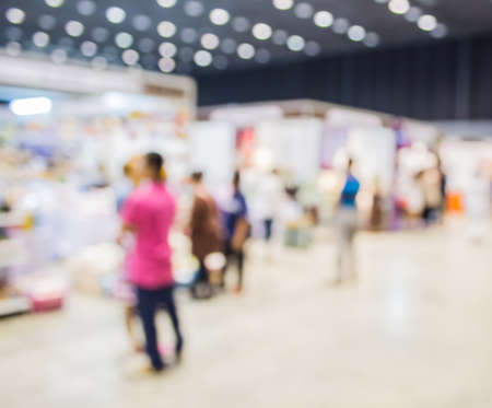Blurred image of people walking at shopping mall , blur background with bokeh .の写真素材