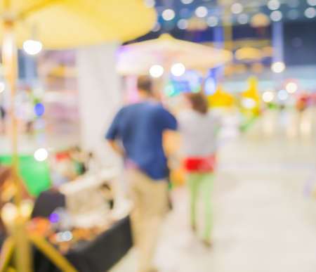 Blurred image of people walking at shopping mall , blur background with bokeh .の写真素材