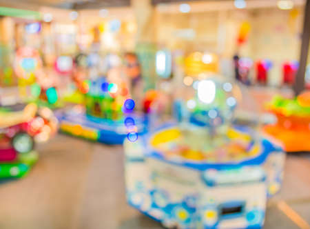 Arcade game machine shop blur background with bokeh image .の写真素材