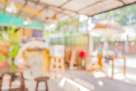 blur image of coffee shop with bokeh on day time for background usage .の写真素材