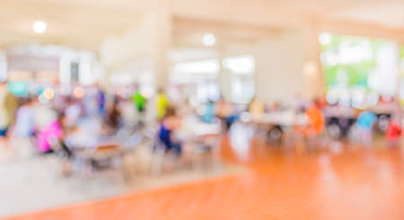 blur image of people in the lobby of a modern food court  with a blurred background.の写真素材