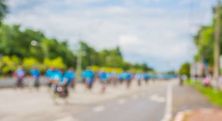 blur image of asphalt road and bike for background usage .の写真素材