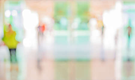 blur image of people in the lobby of a modern business center with a blurred background.の写真素材