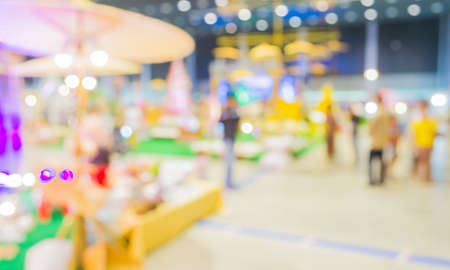 Blurred image of people walking at shopping mall , blur background with bokeh .の写真素材