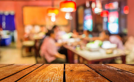 blur image of restaurant or food center with light bokeh foy background.