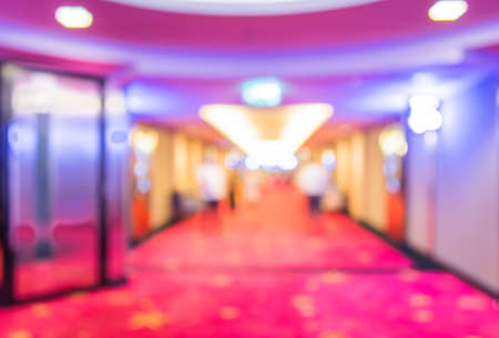 blurred image of people at cinema's corridor for background usage .の写真素材