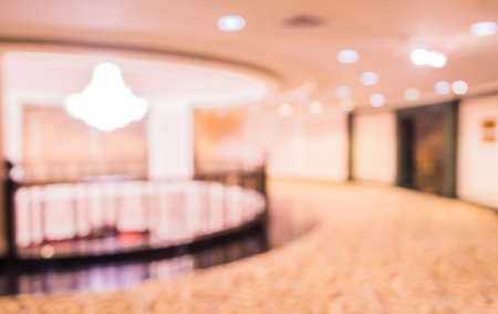 image of blur luxury chandelier with round corridor in hall for background usage .の写真素材