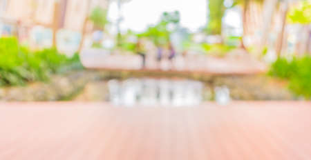 blur image of people at wooden floor and river for background usage.の写真素材