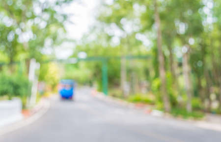 image of blur tram on the road with bokeh .の写真素材