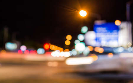 image of blur street  bokeh  with warm colorful lights in night time for background usage .