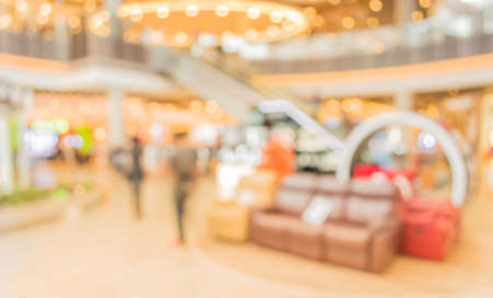 blur image of people in the lobby of a modern business center with a blurred background.の写真素材