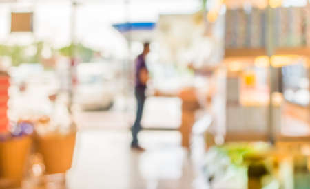 Coffee shop on day time blur background with bokeh image .の写真素材