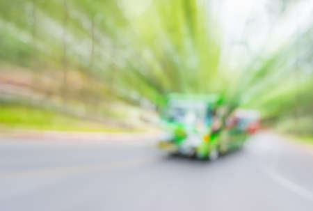 image of blur tram on the road with bokeh .の写真素材